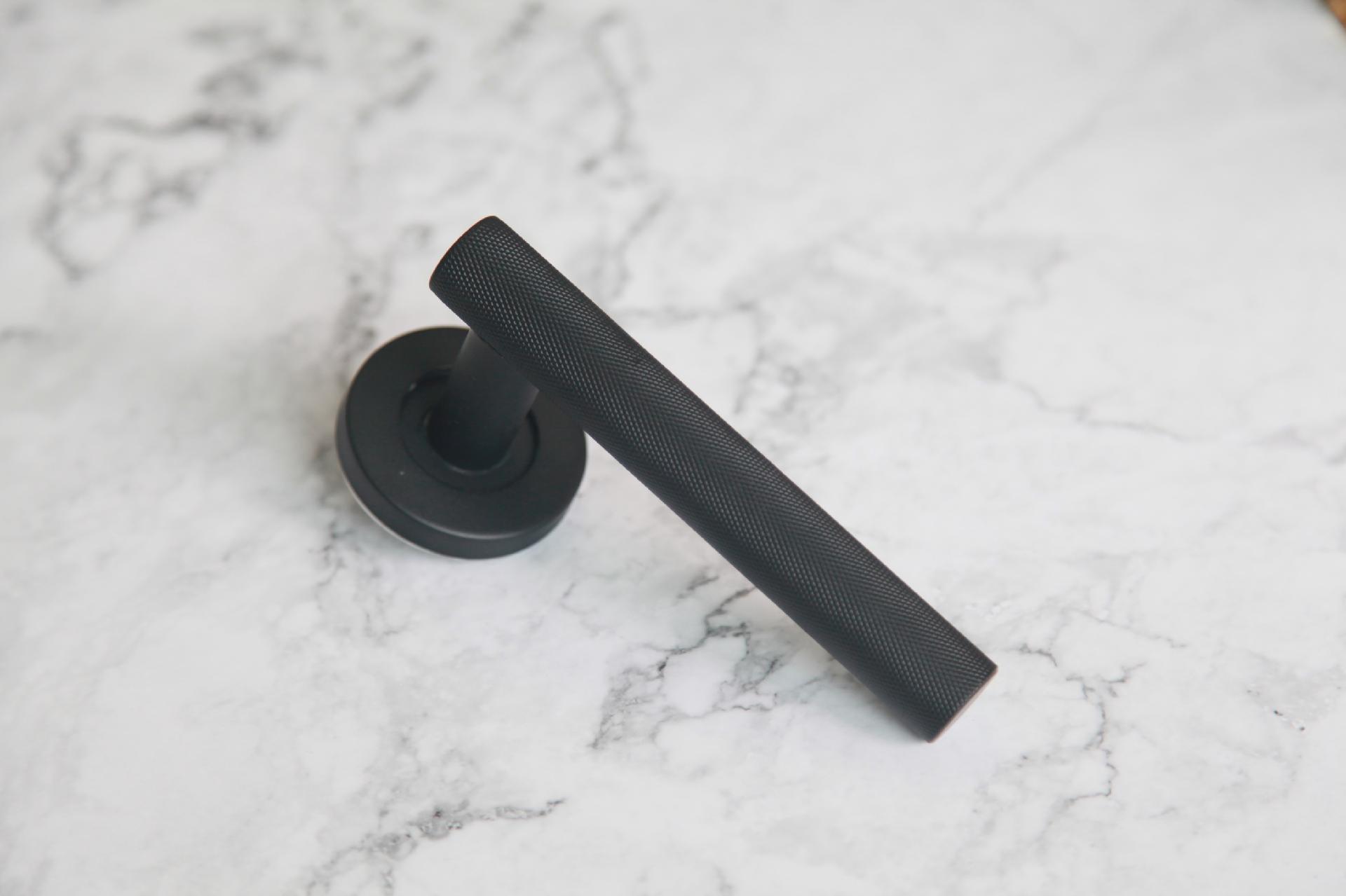 Knurling matt black door handle